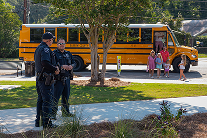 School Enrollment Photo of a school bus with children